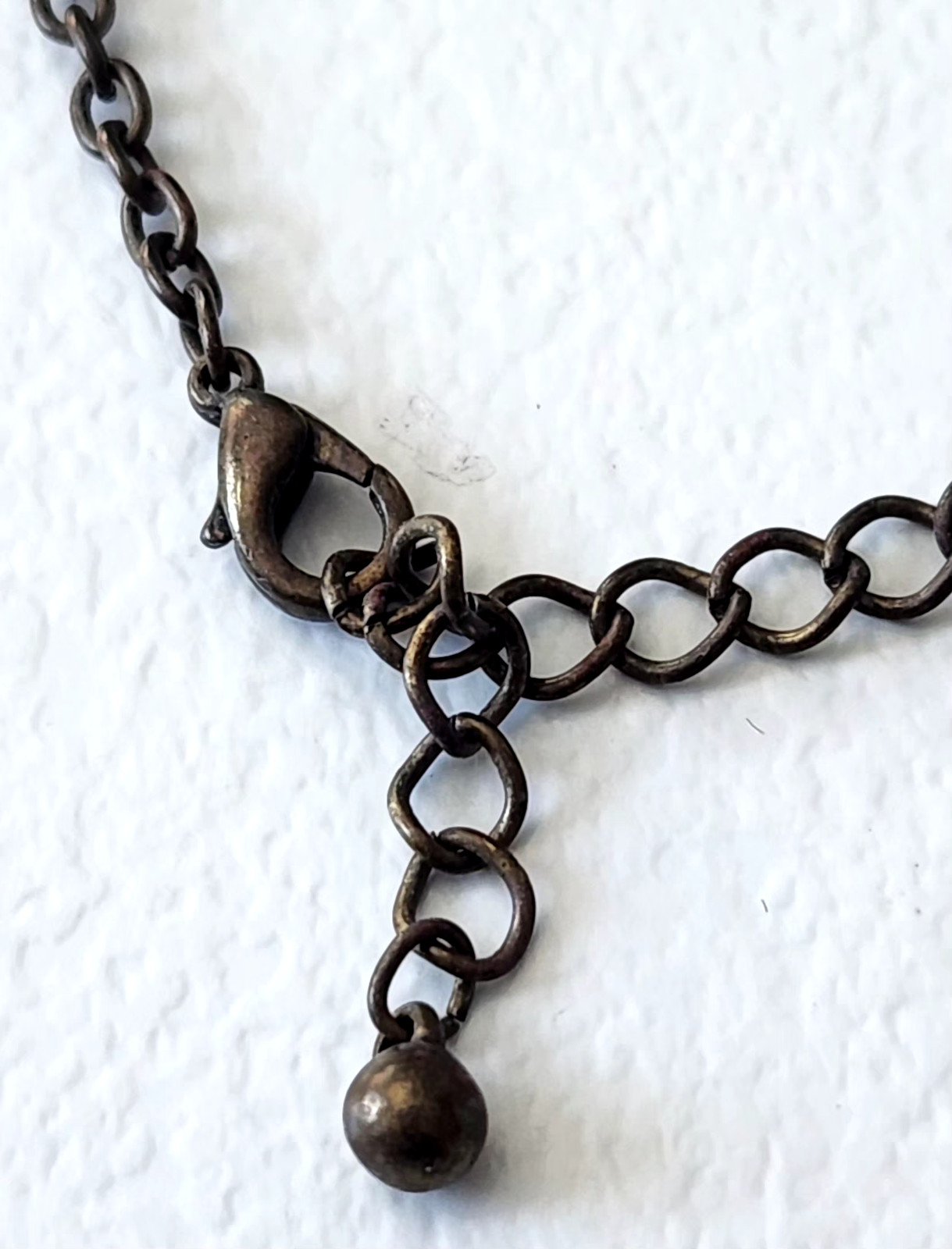 Antique necklace bronze/goldtone designed amber color flower quatrefoil pendant