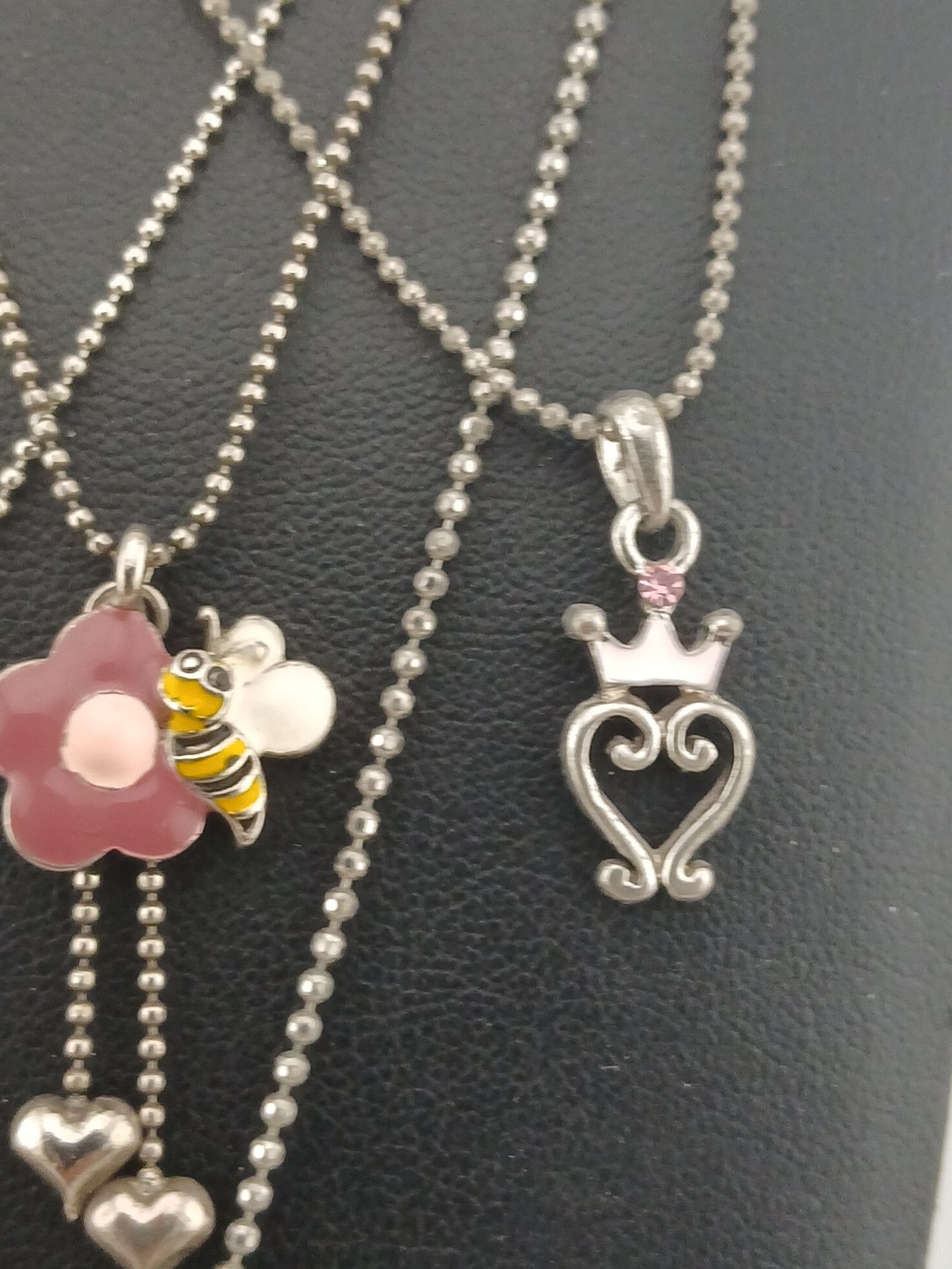 New Old Stock lot of 4 COOKIE LEE silver tone assorted figural pendant necklaces