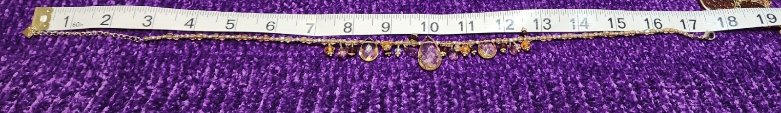 Vtg Cookie Lee faceted Purples/Yellows Lucite Charm Necklace on pale Gold chain