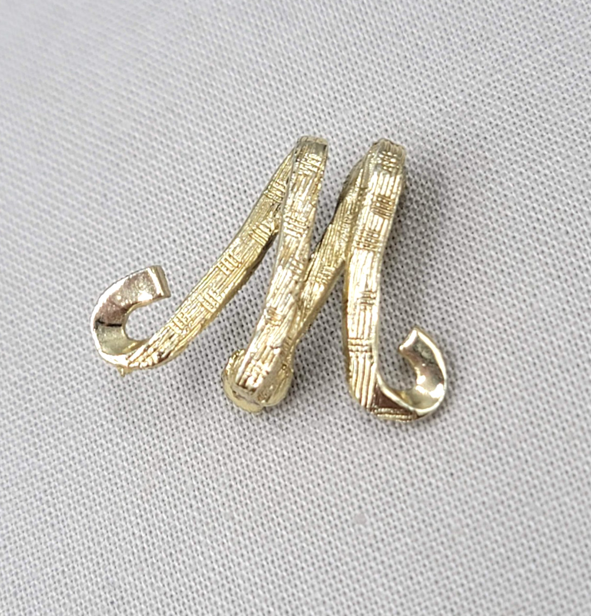 Vintage Small Letter M Brooch Light Embossed Gold tone 3/4″