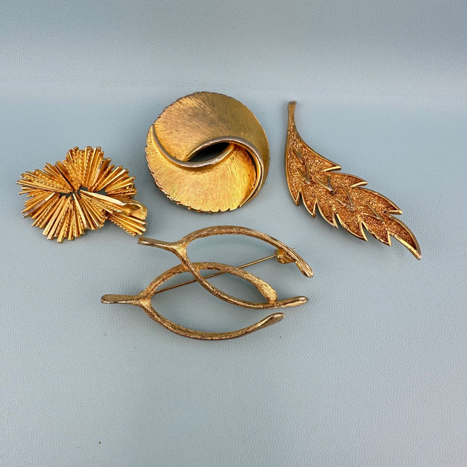 Vintage Designer Brooch Lot Gold Tone Textured Brushed Leaf Wishbone Signed