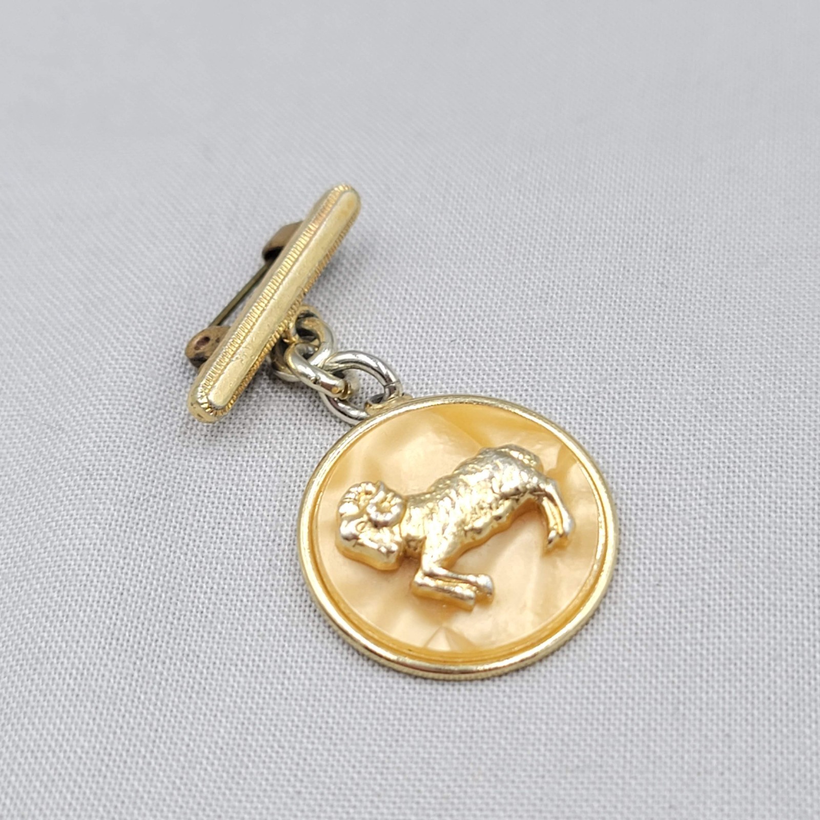 Vintage Aries Pearlized Brooch Gold tone 1 5/8″