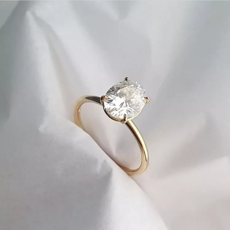Oval Cut 2.00CT White Moissanite Women’s Engagement Ring In 10K Yellow Gold FN