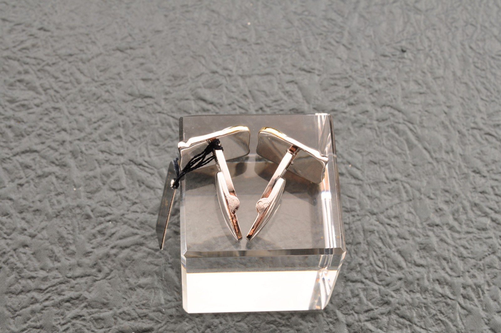 Near mint, gold and Cufflinks and silver tie clip, “Yves Saint Laurent”, case.