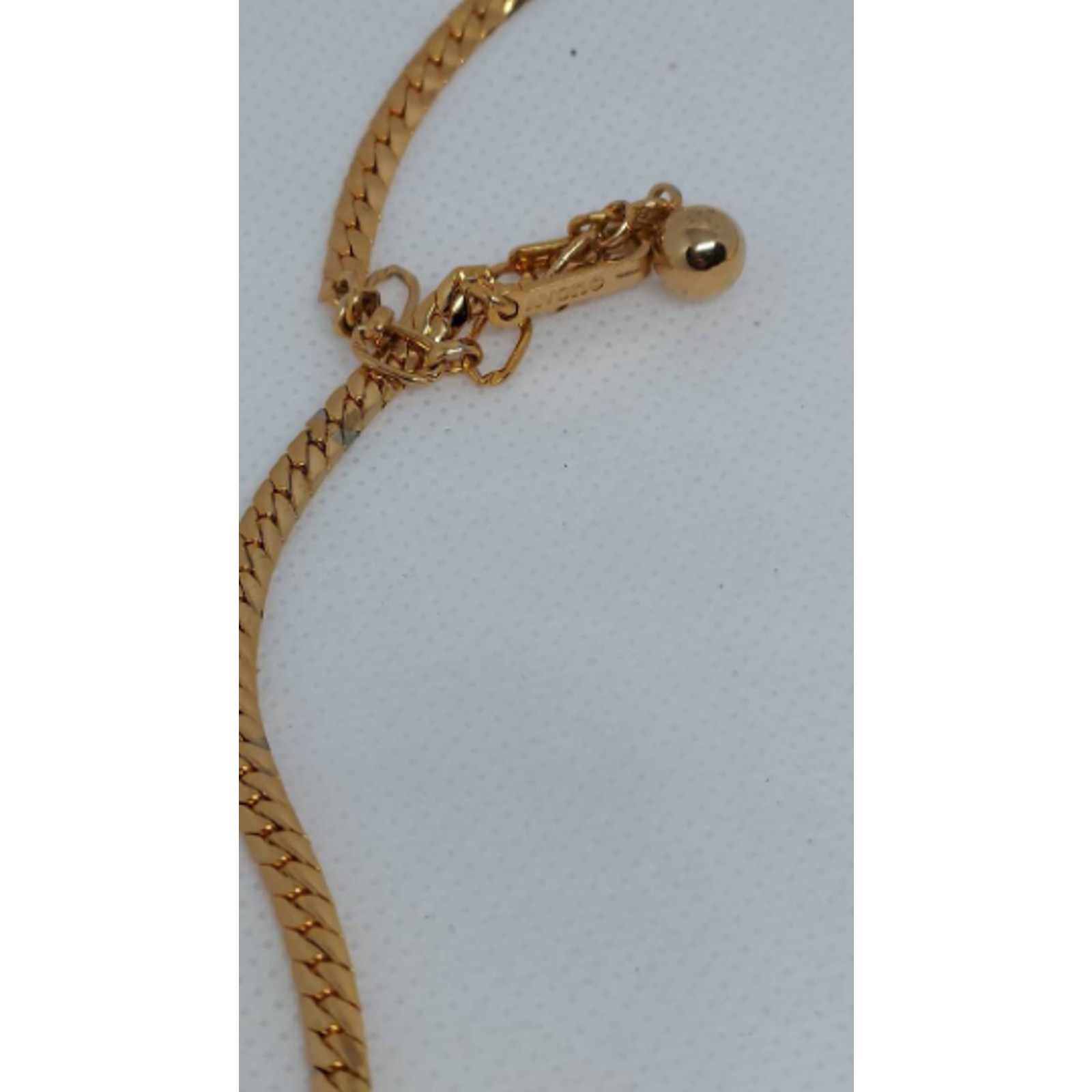 Vintage Avon tassel necklace V whale tail gold tone