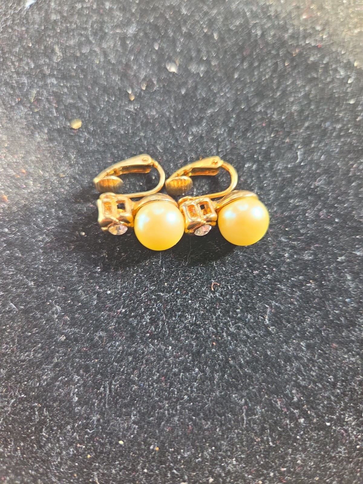 Four pairs of 10k gold plated one pair pearls clip-ons Avon.
