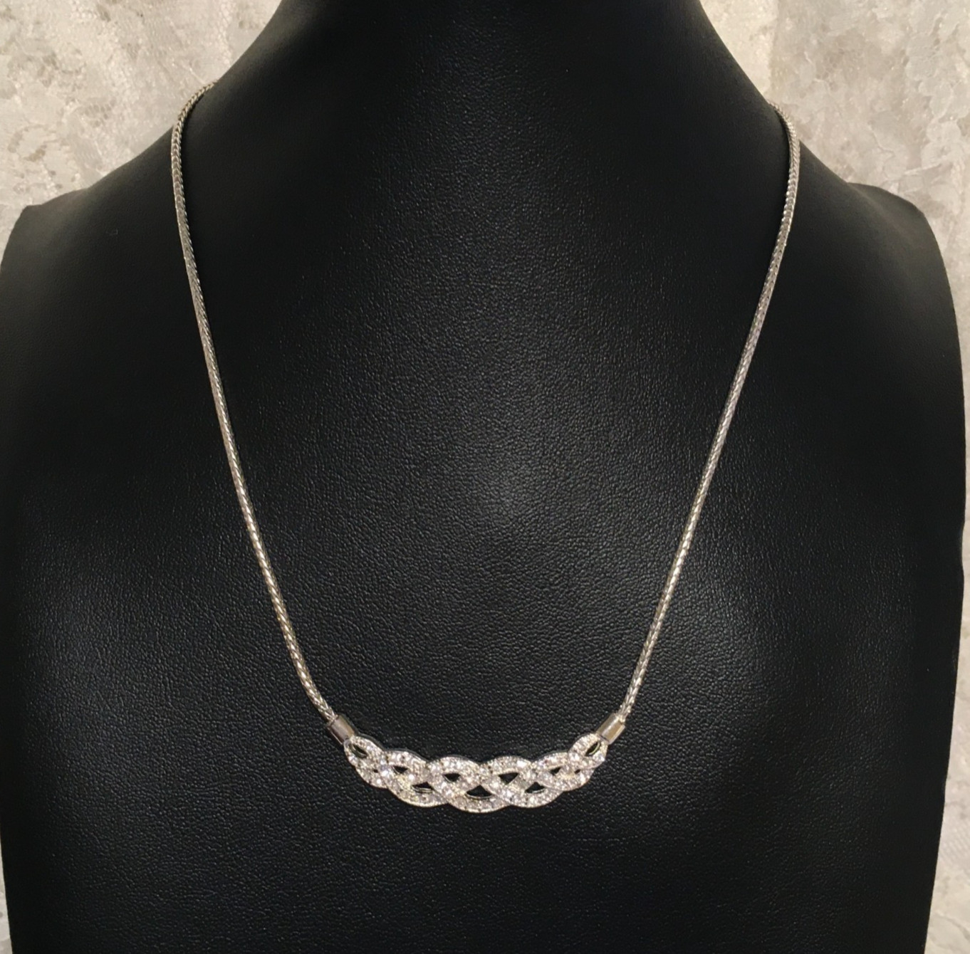 Vintage Interwoven Curved Pendant Necklace Roman signed Rhinestones Silver tone