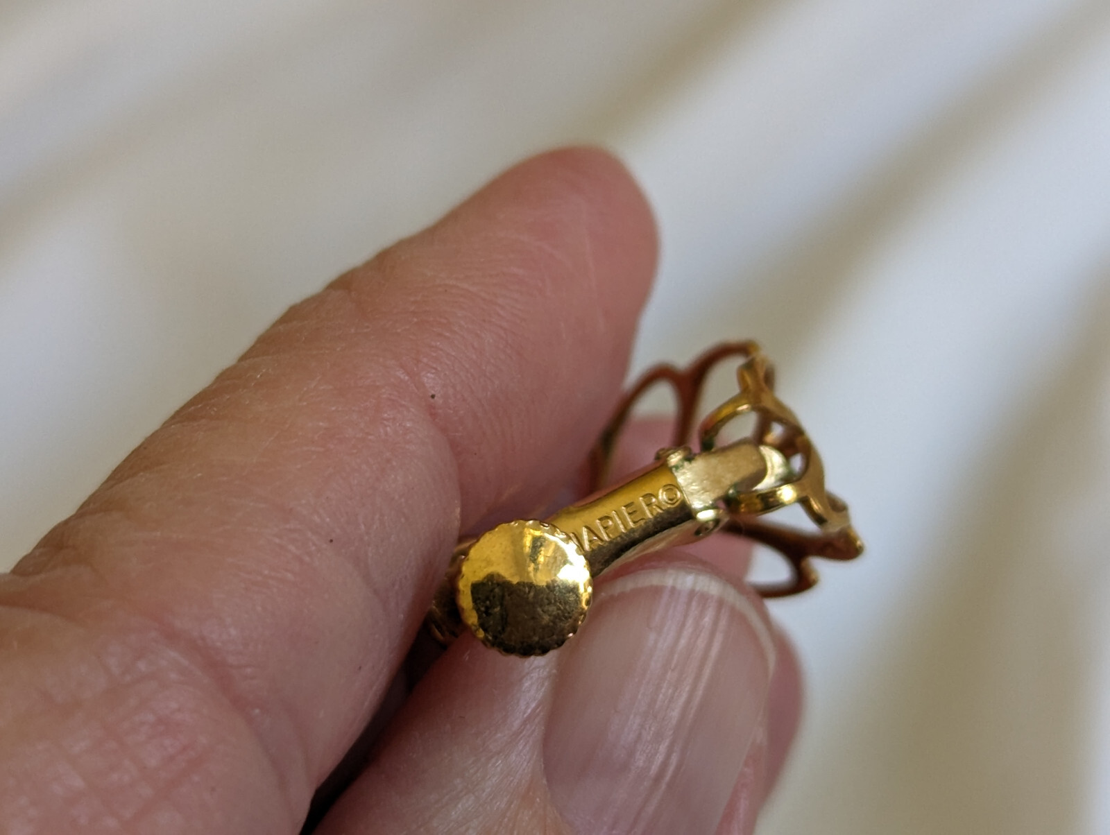 Napier yellow gold plated hoop clip on earrings .75″ long