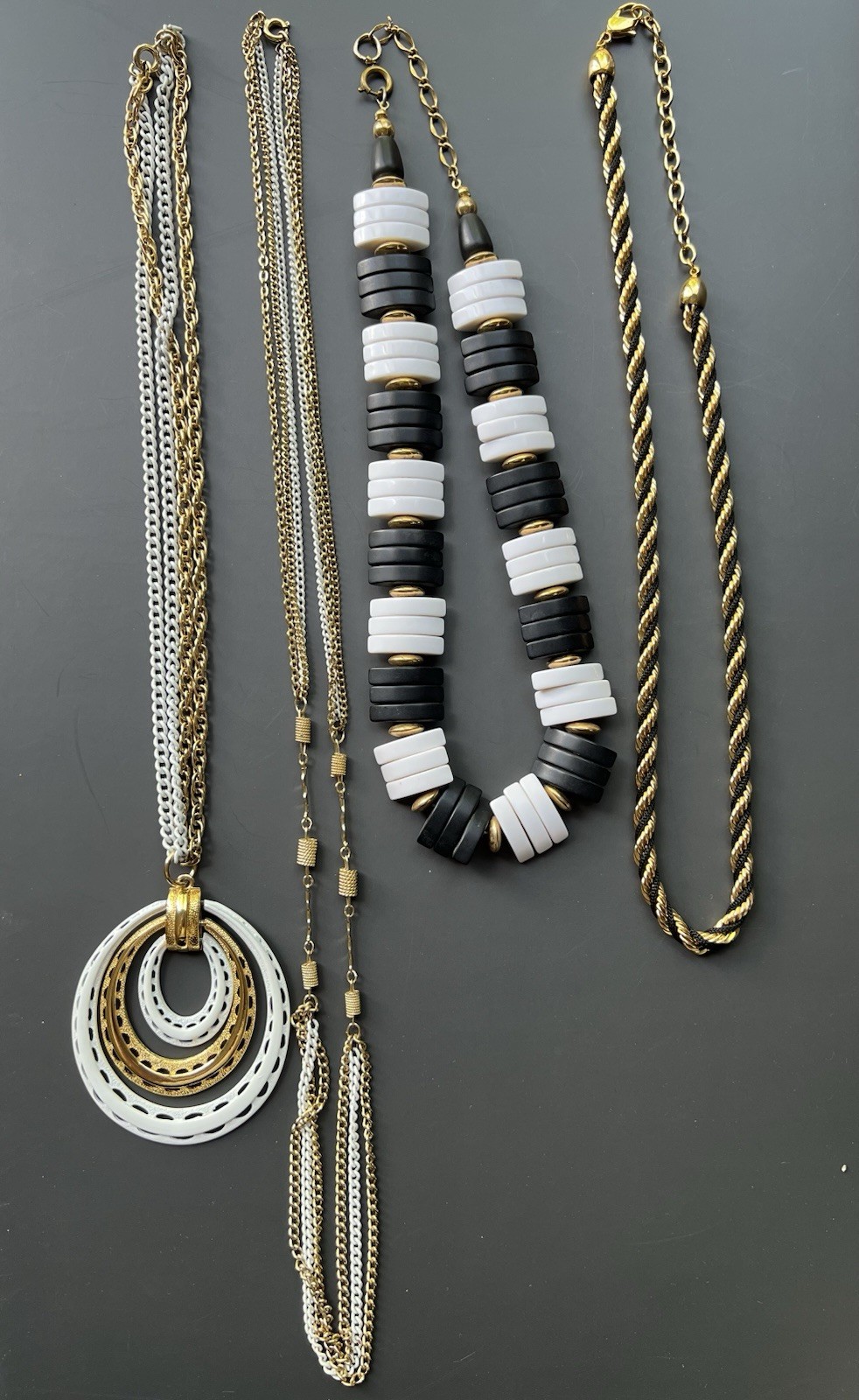 Vintage Black, White, & Gold Jewelry Lot Incl Avon, Sarah Coventry, Monet