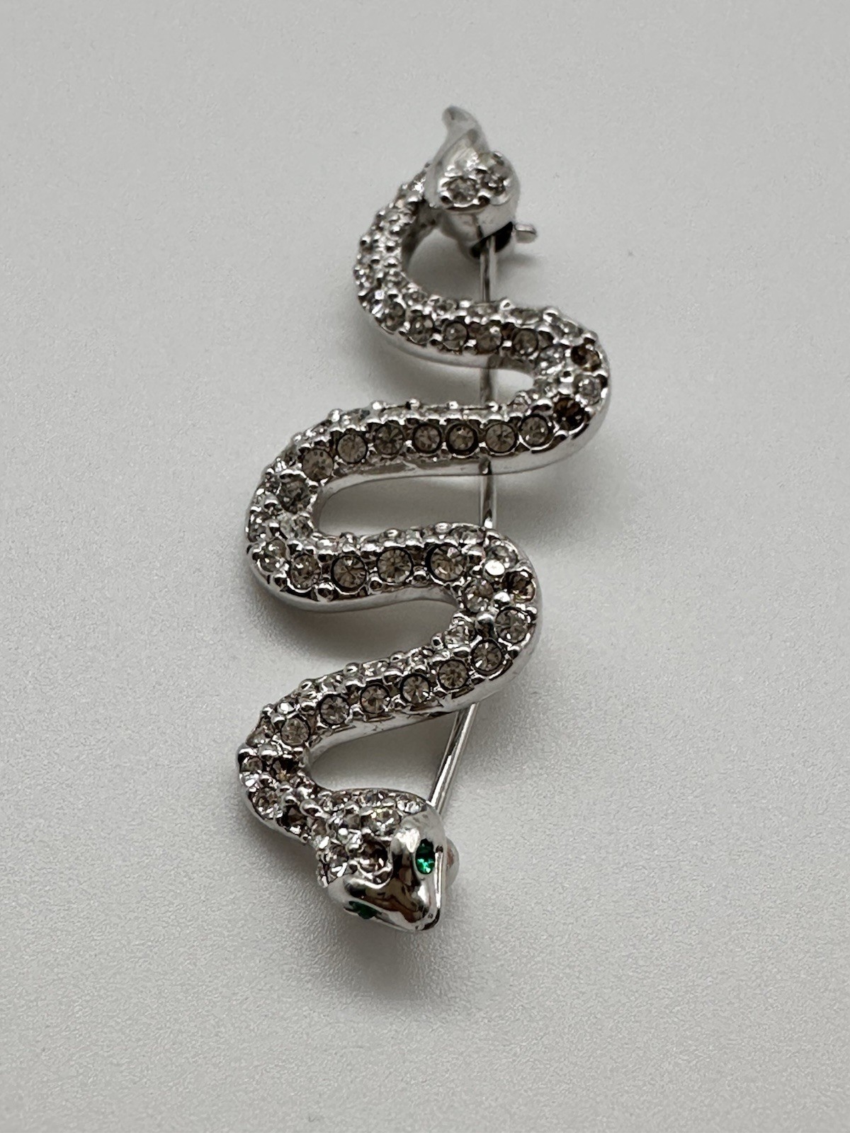 Vintage Swarovski Swan Silver tone Pave Crystal Snake brooch green eyes