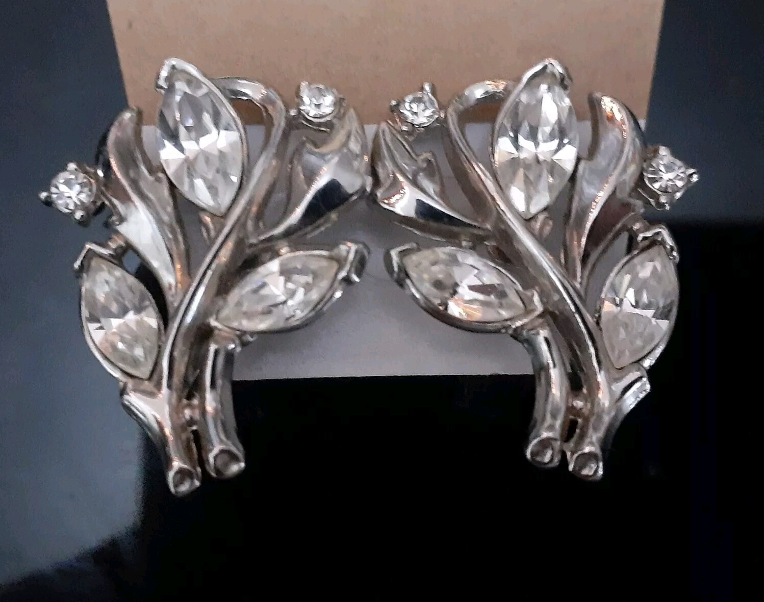 Vintage Crown Trifari rhodium plated marquise cut rhinestone clip on earrings