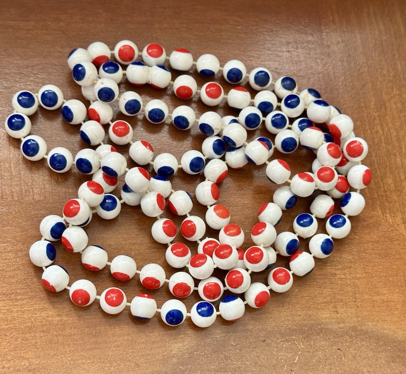 Vintage 1950 red, white andblue plastic puzzle bead necklace