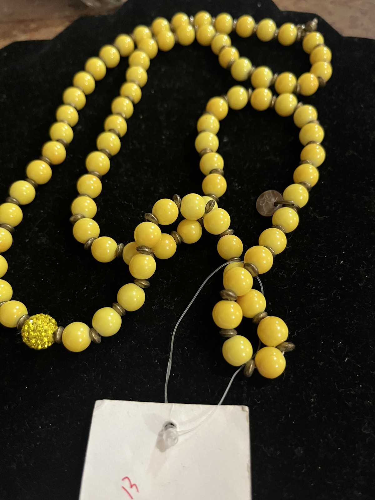 Very Vintage Yellow Beaded Stamped Moon C Necklace.