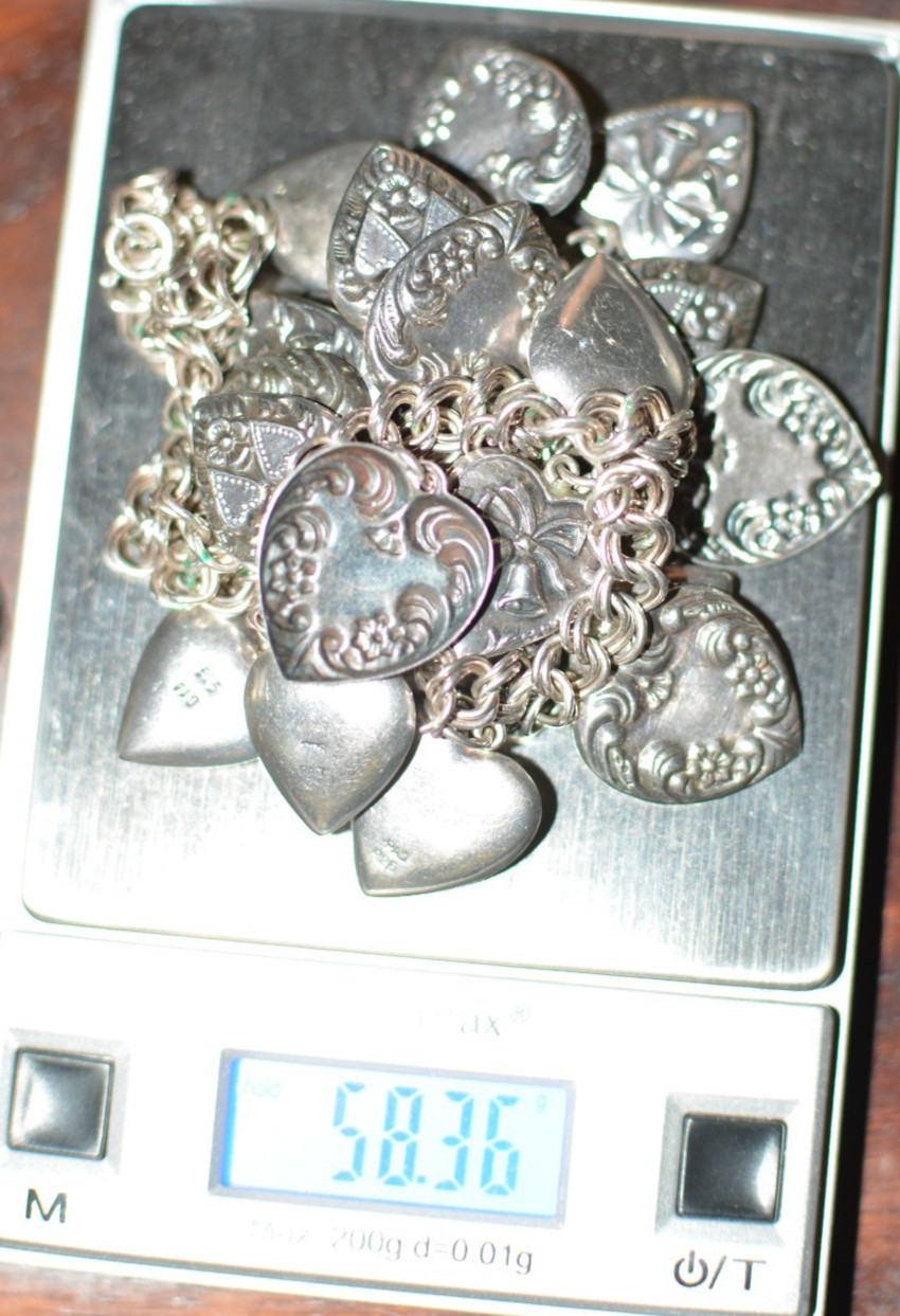 Signed PAJ 925 repousse multiple heart charms necklace 58 grams 24 inches long