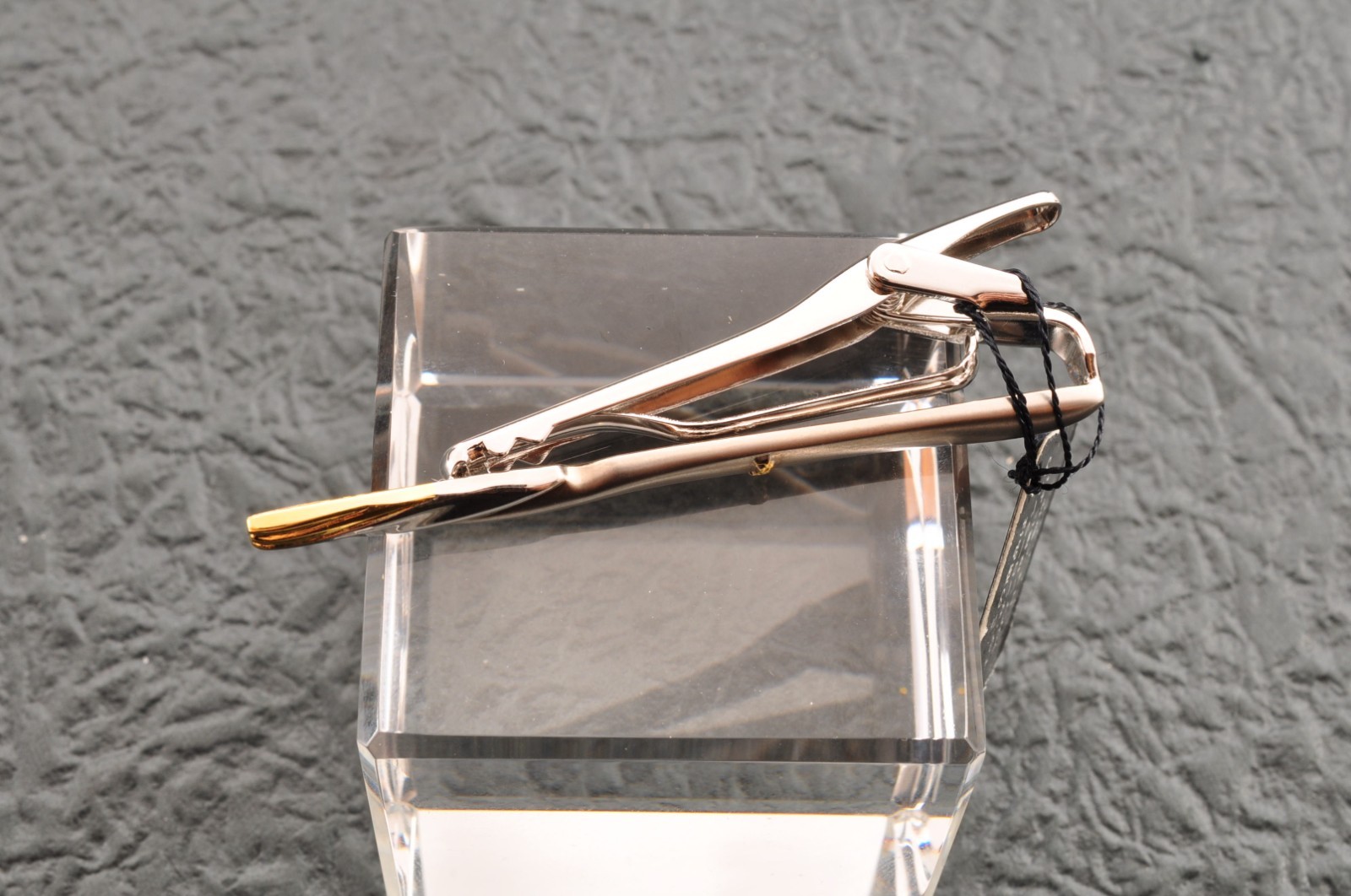 Near mint, gold and Cufflinks and silver tie clip, “Yves Saint Laurent”, case.