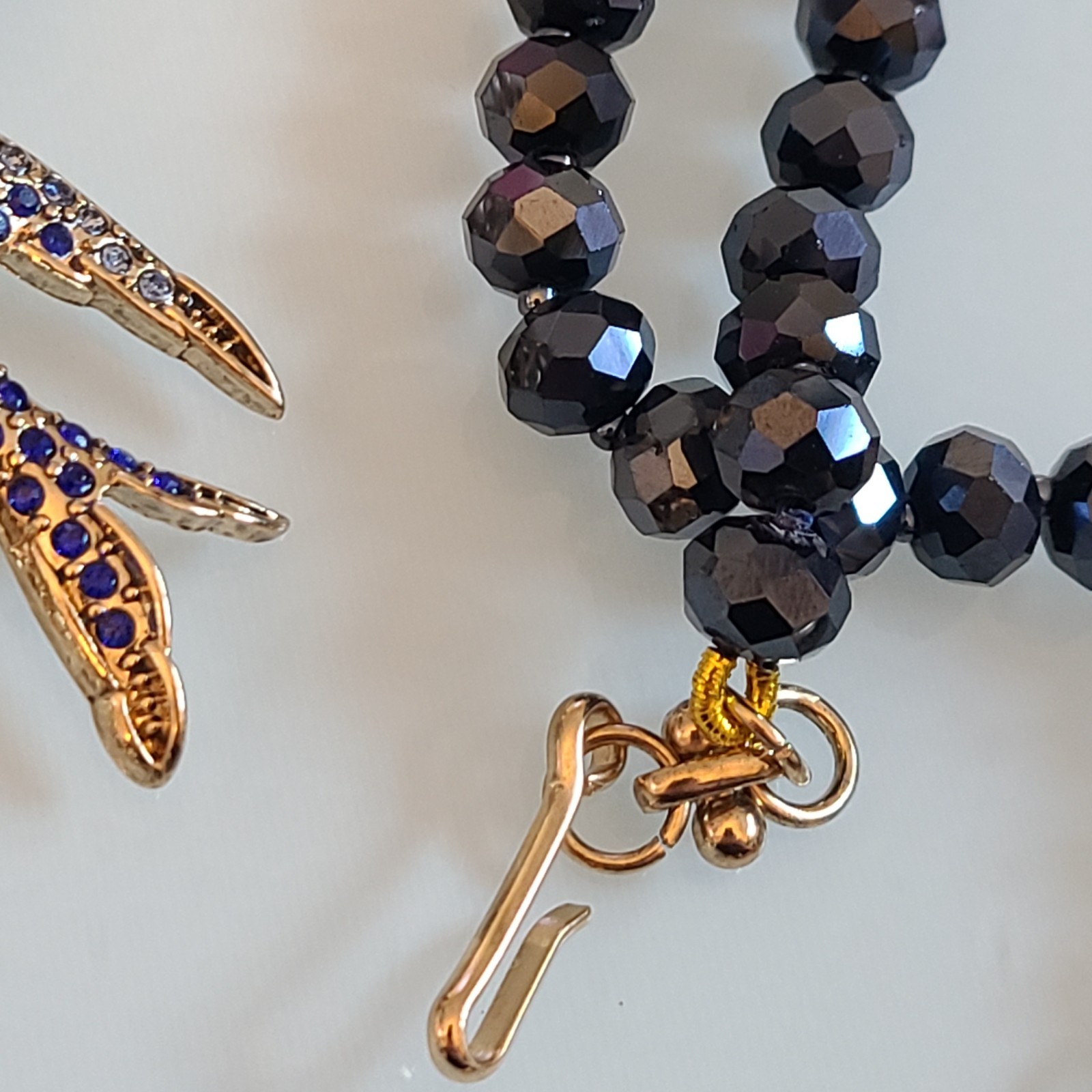 Signed Lihangyuan Twin Flying Birds Necklace Blue Rhinestone Black Bead 5″ Drop