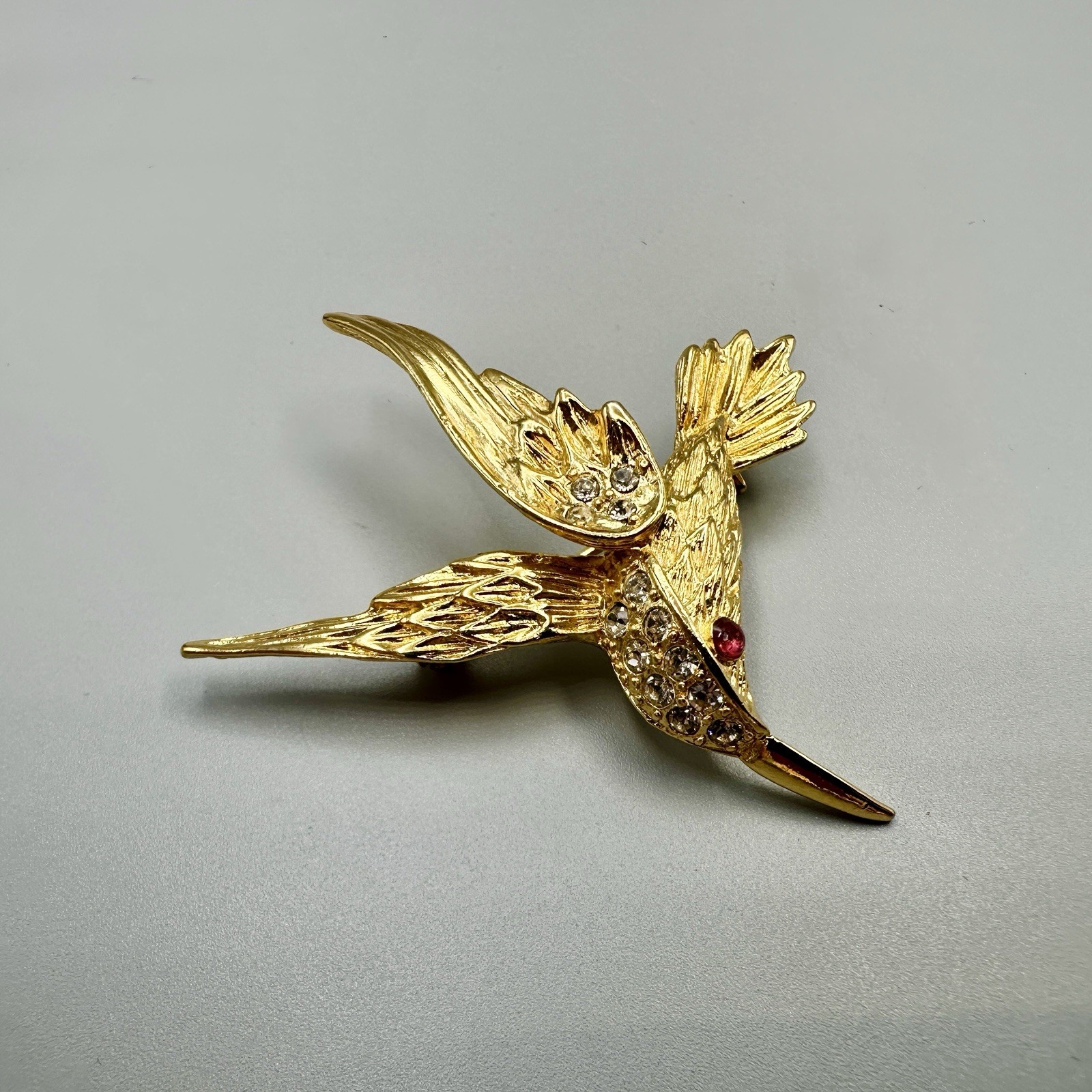 Vintage Hummingbird In Flight Brooch Pin Gold Tone Clear Rhinestones Red Eye 3D