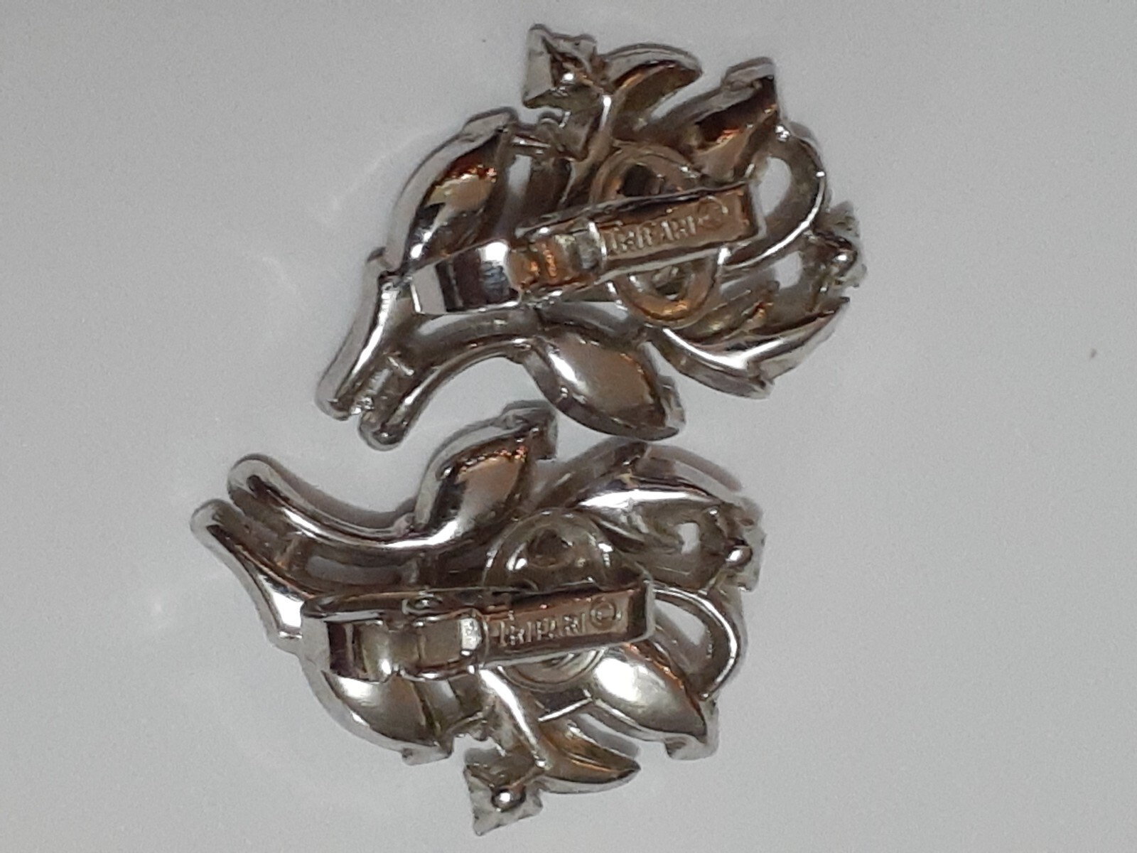 Vintage Crown Trifari rhodium plated marquise cut rhinestone clip on earrings