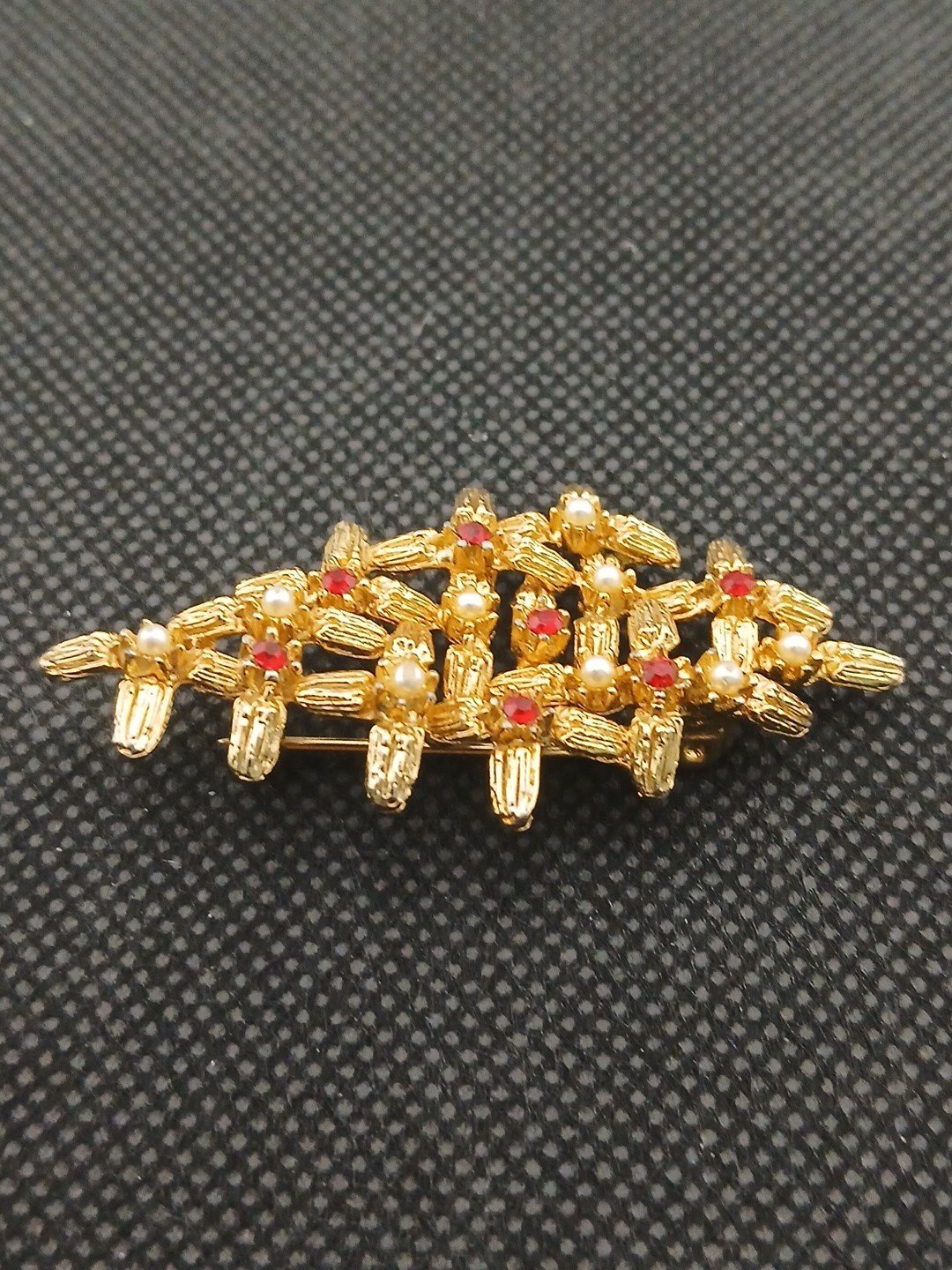 Unique goldtone lattice metal work brutalist faux pearls & rubies brooch