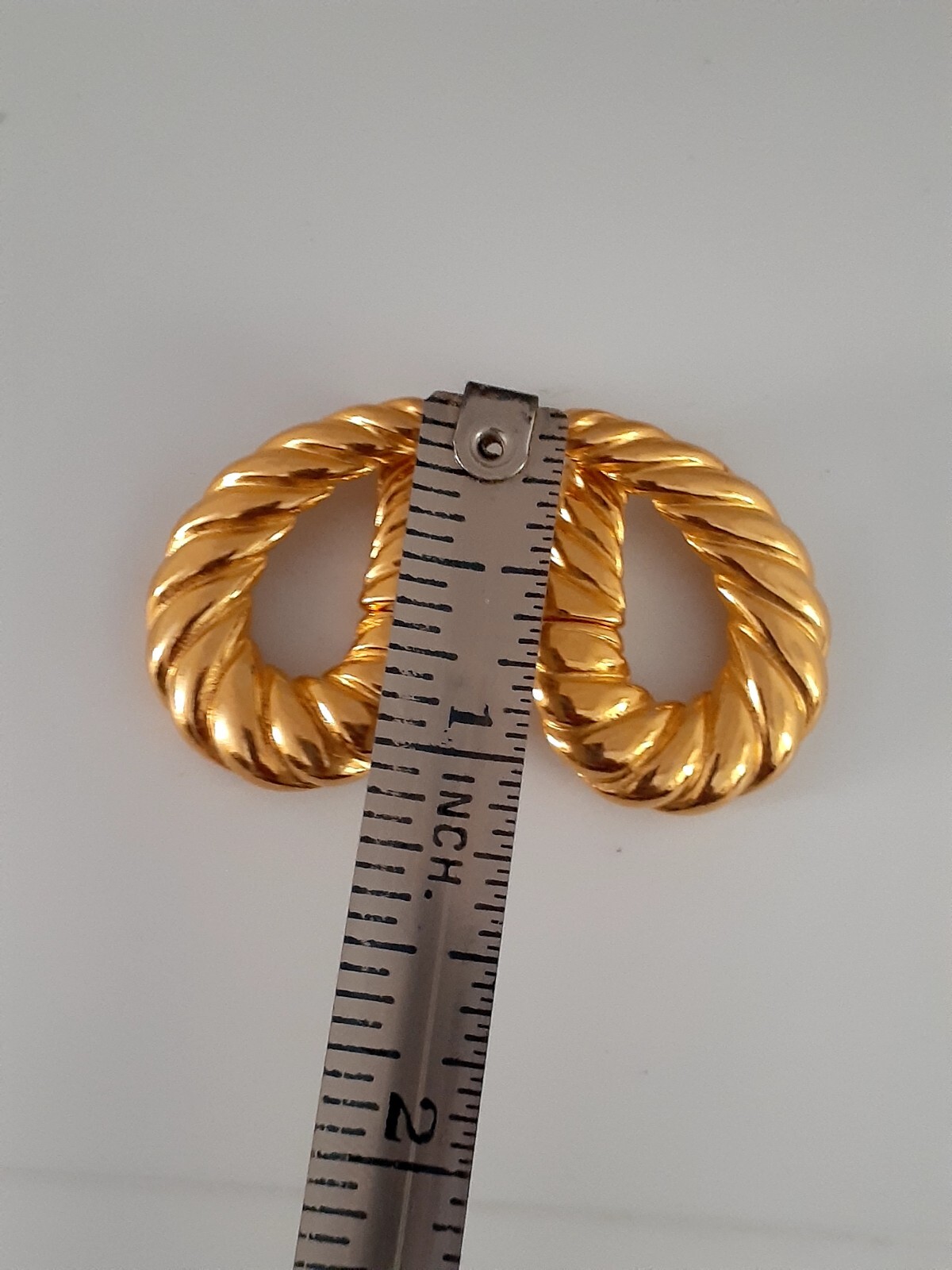 Lancer Gold tone ribbed hoop Huggie Clip on Earrings