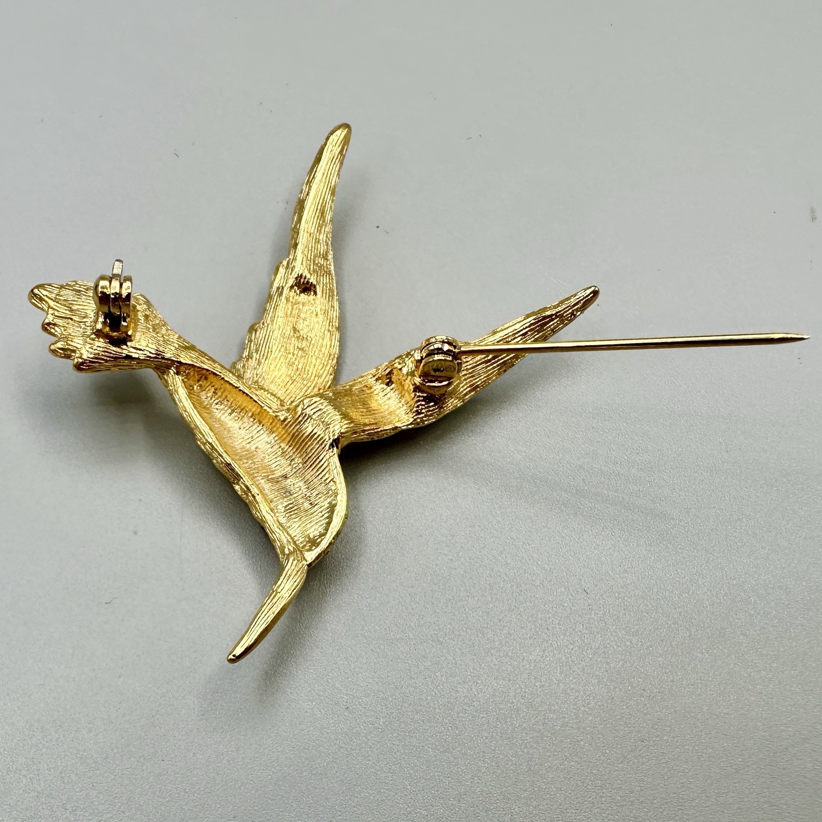 Vintage Hummingbird In Flight Brooch Pin Gold Tone Clear Rhinestones Red Eye 3D