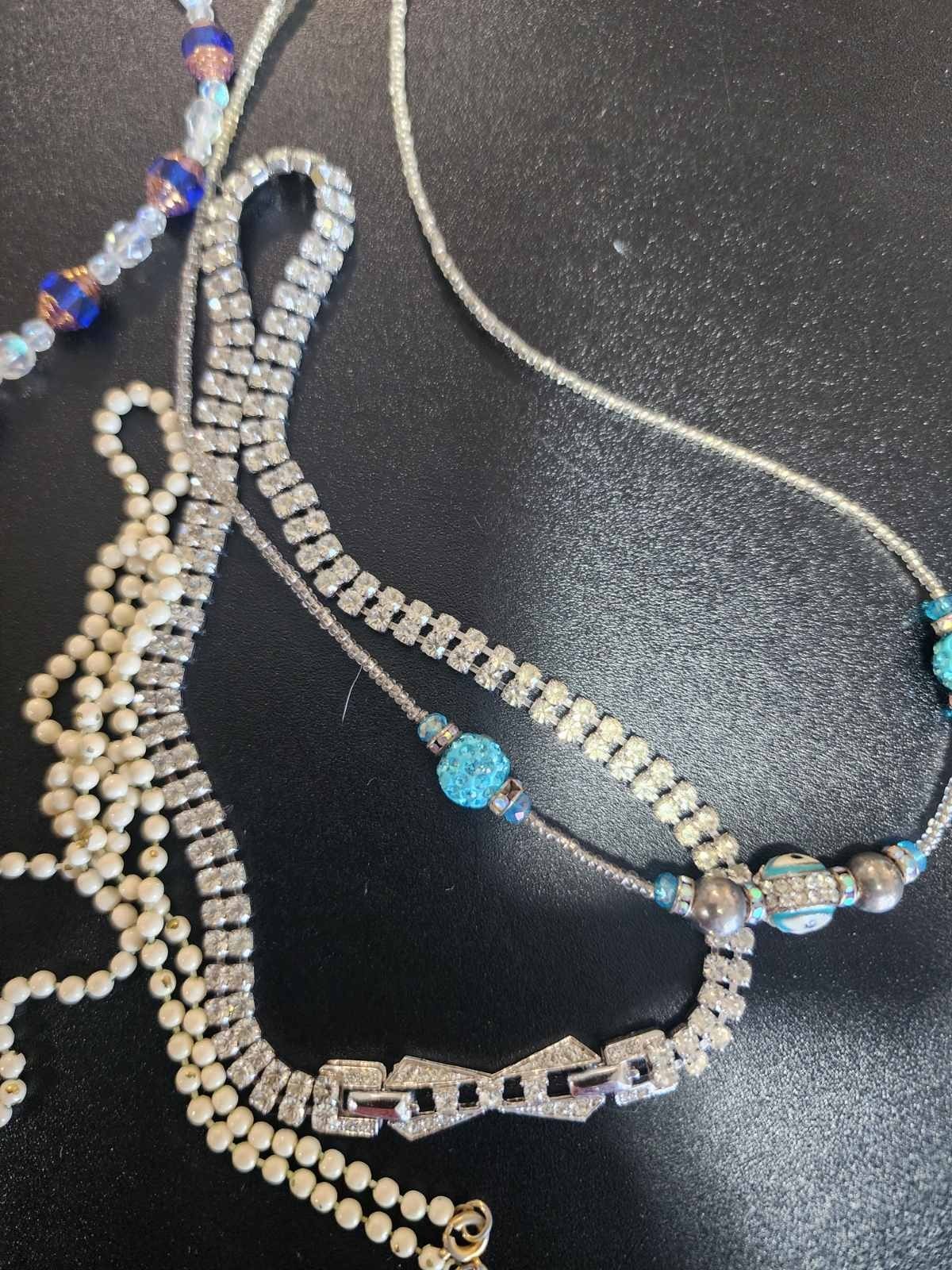 Vintage jewelry set of 21 in vintage purse