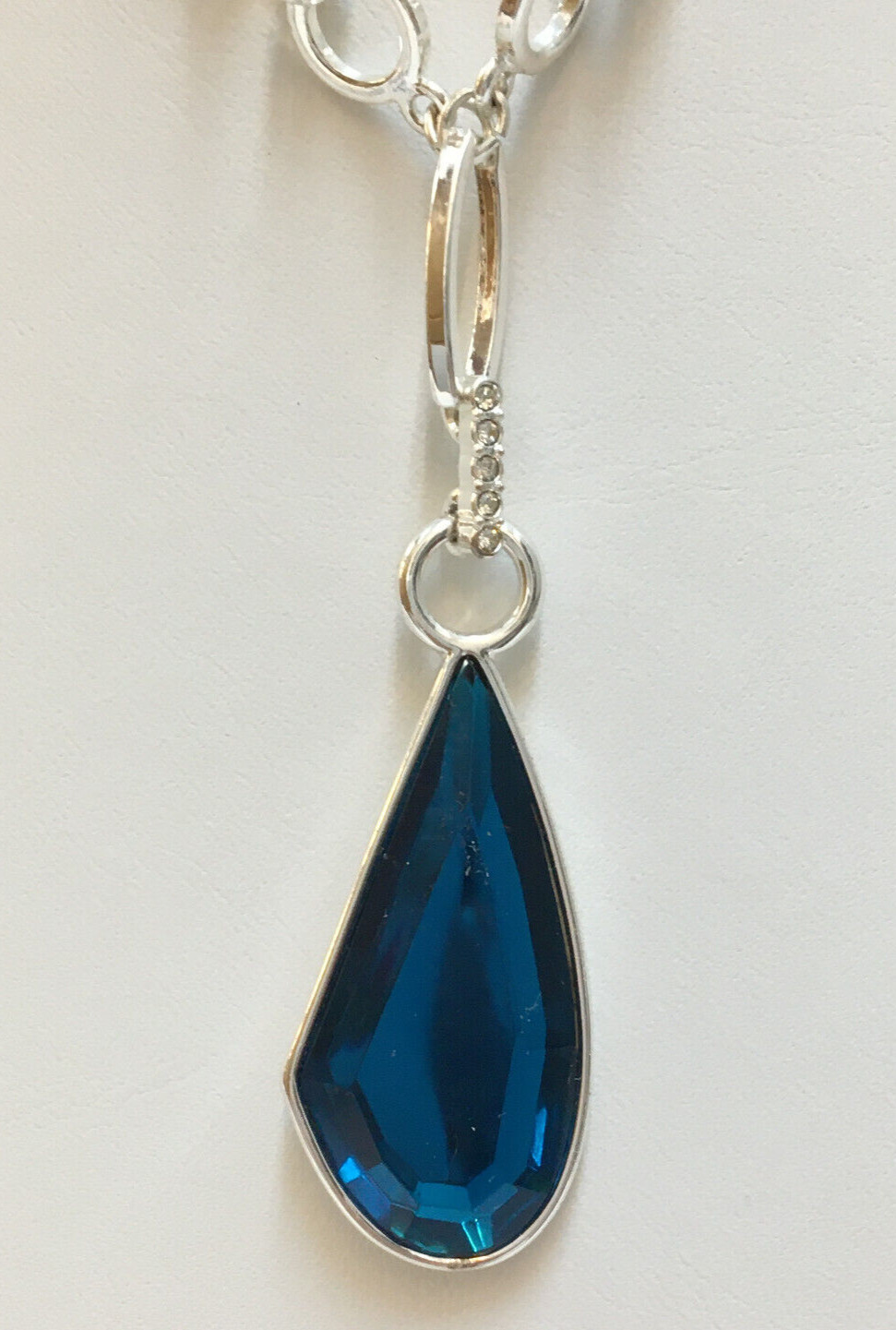 Silver Tone Necklace Blue Faceted Teardrop Pendant And Clear Rhinetone Accents