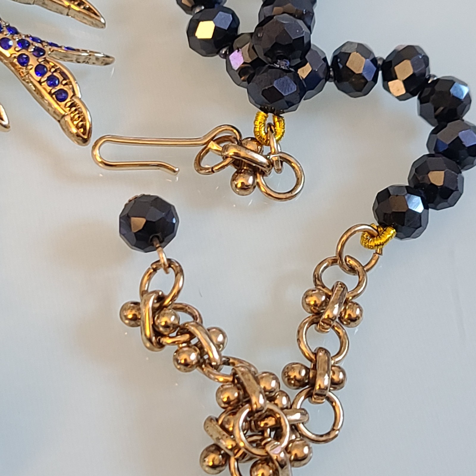 Signed Lihangyuan Twin Flying Birds Necklace Blue Rhinestone Black Bead 5″ Drop