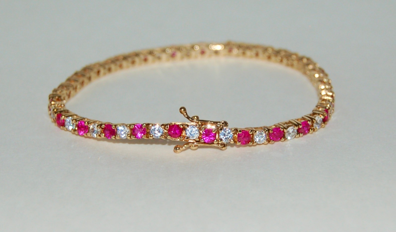 Gold Plated Sterling Silver 925 Ruby Red & Clear CZ Tennis Bracelet 7-1/4″