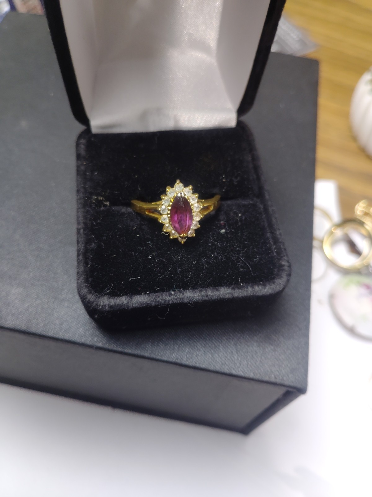 Vintage Amethyst Ring Set On An 18k Gold Band With White Saphire Accent Stones