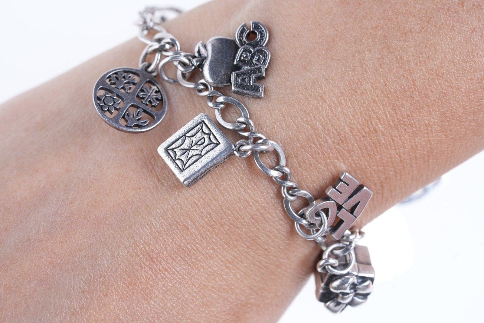 7.75″ James Avery Sterling silver Charm bracelet with lots of charms