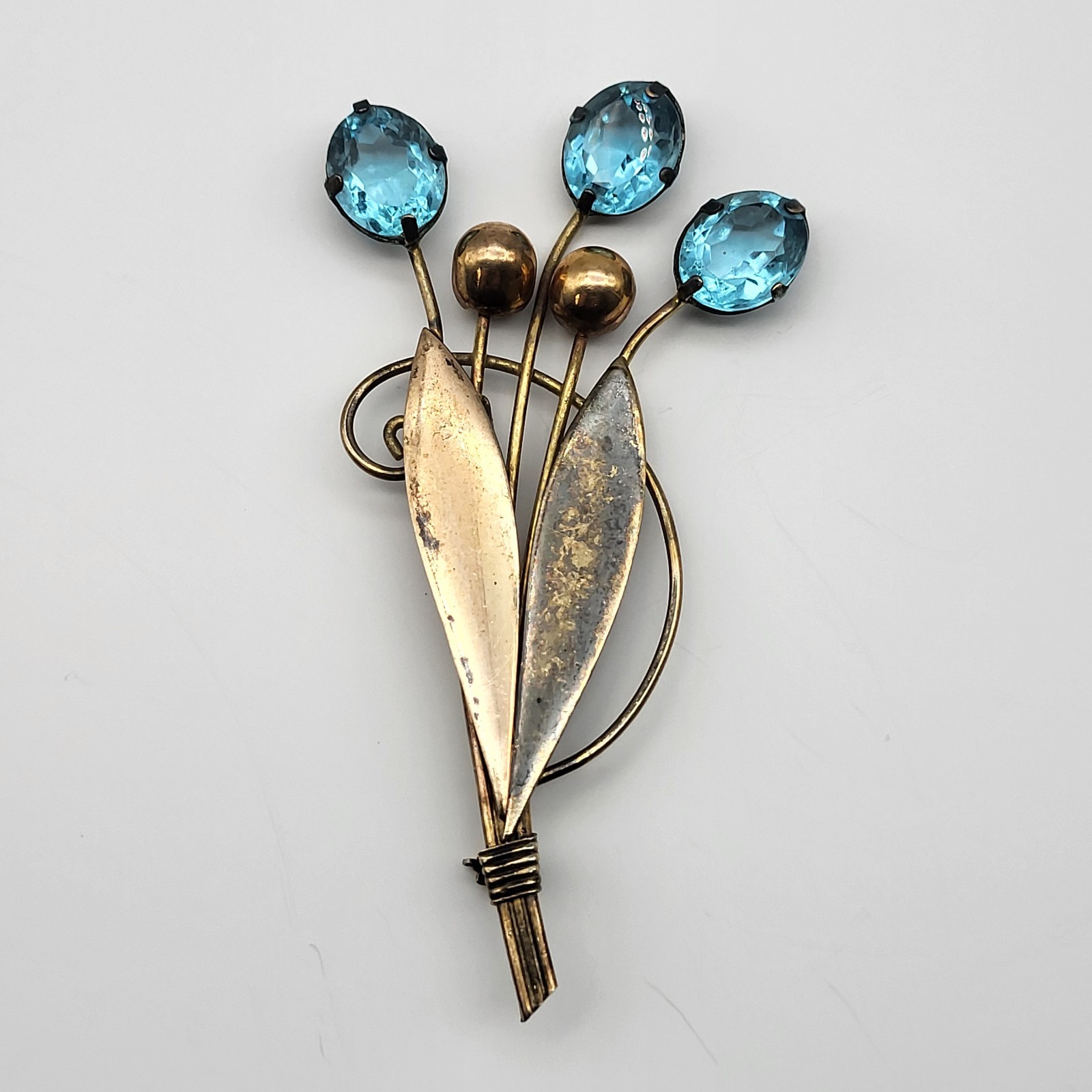 VTG 1/20th 12K gold filled Aqua Blue rhinestone cattail frond brooch pin Patina