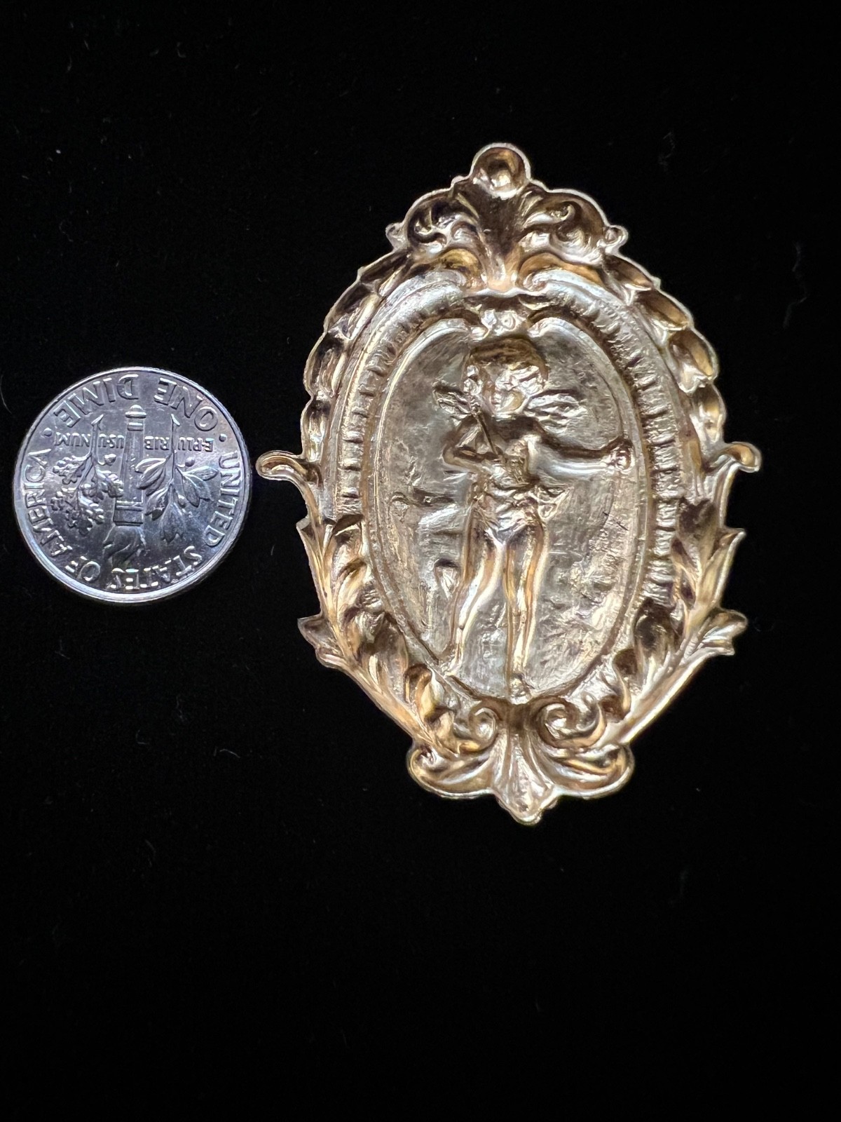 Vintage brass stamping. Cherub design. Victorian Antique from famous manufacture