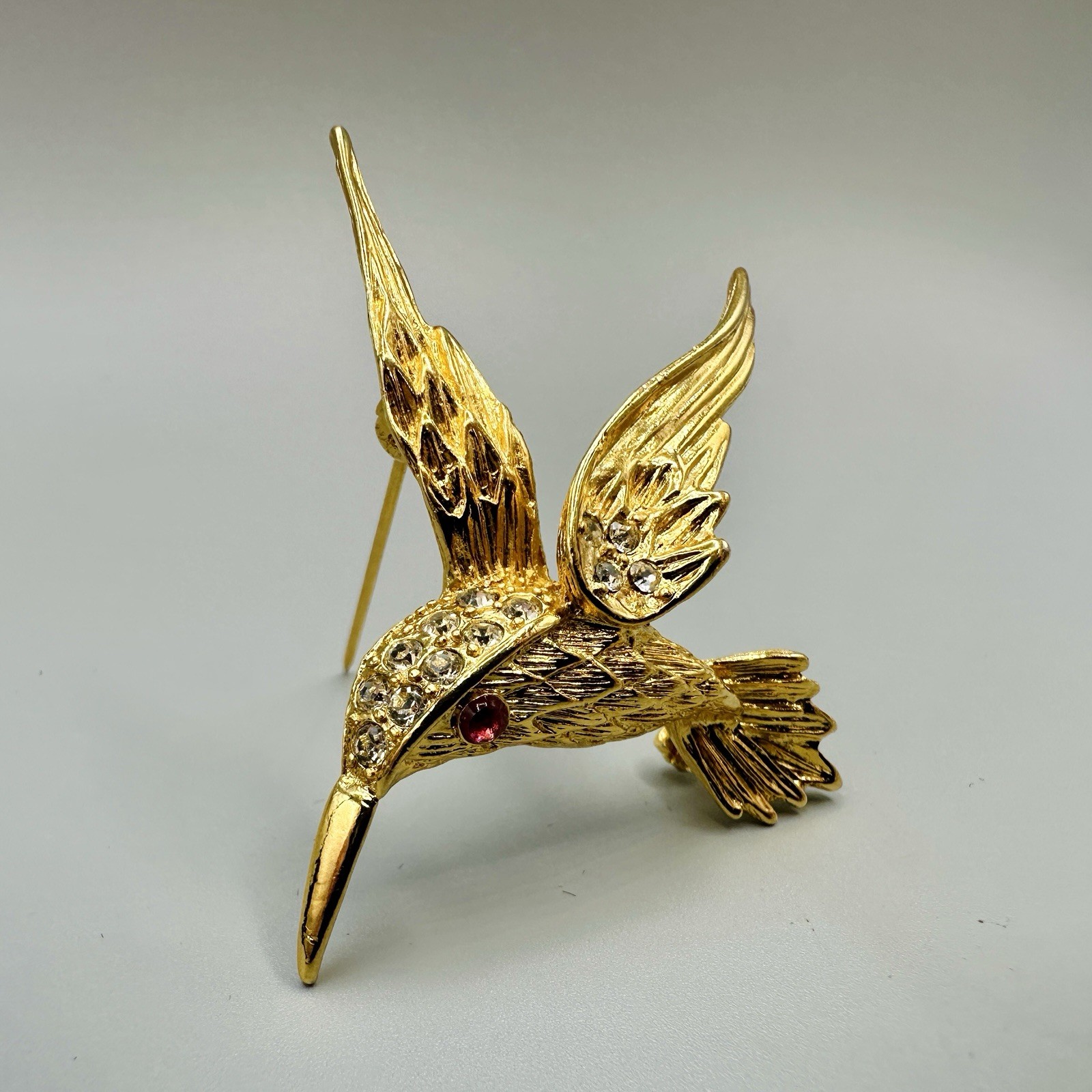 Vintage Hummingbird In Flight Brooch Pin Gold Tone Clear Rhinestones Red Eye 3D