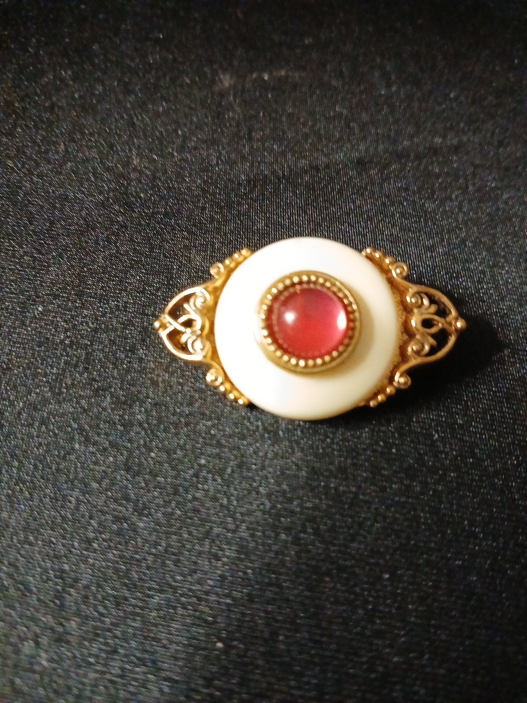 White Cream Colored Lucite Brooch with Red Glass Cabachon in Goldtone Filligree