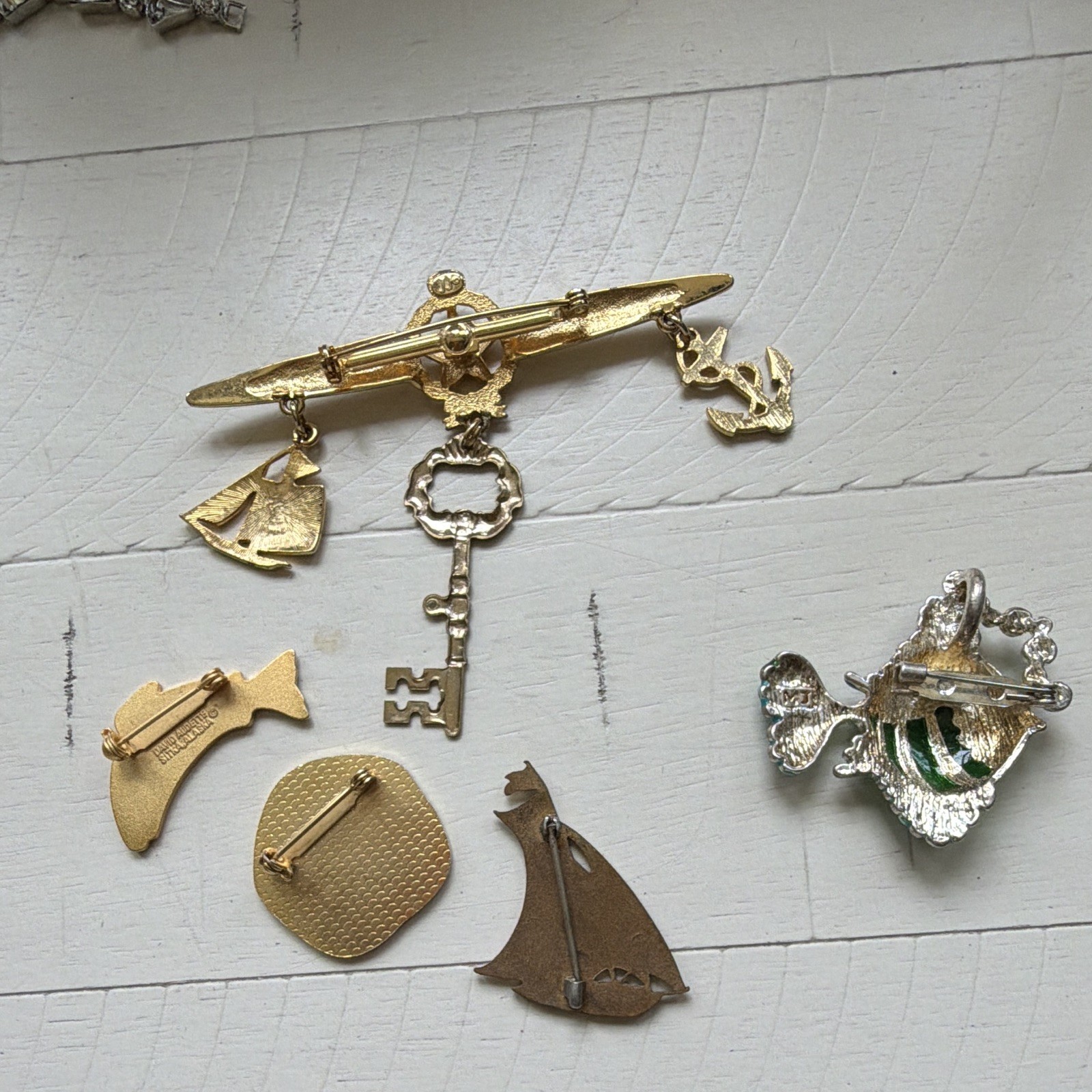 1 vintage David Audette fish pin with 4 other nautical beauties