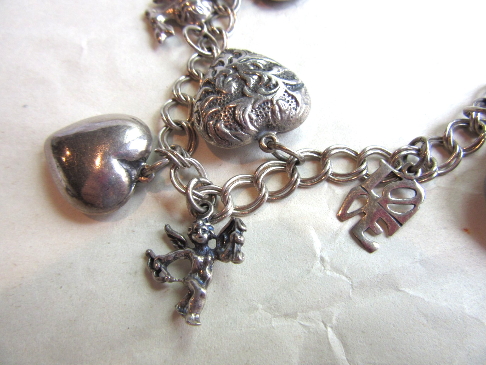 Vintage double link chain necklace with 22 heart, love themed charms 61.8 grams