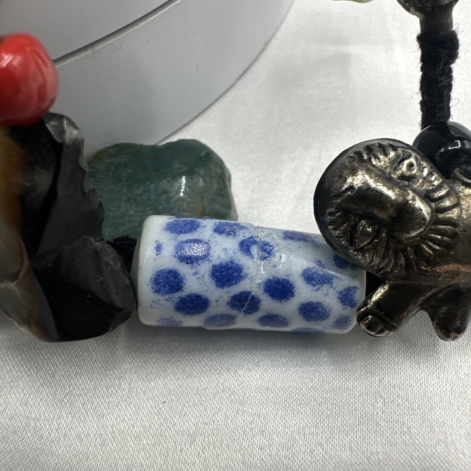 Vtg Indian Glass Beads Stone Nuggets and Seven Puffed Animals Cord Necklace.Read