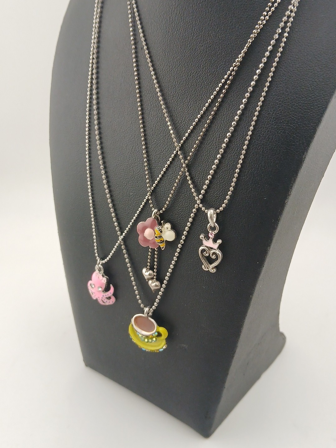 New Old Stock lot of 4 COOKIE LEE silver tone assorted figural pendant necklaces