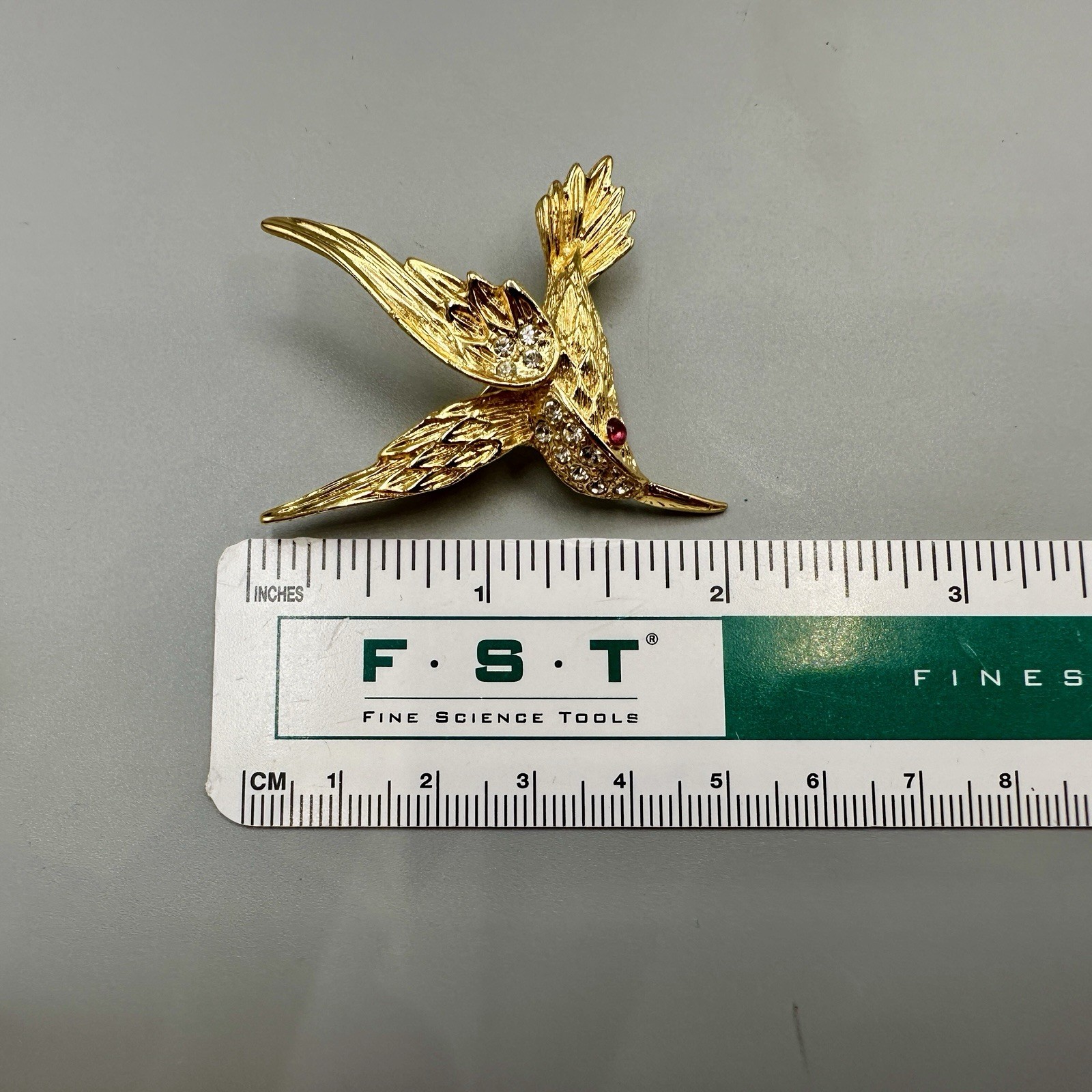Vintage Hummingbird In Flight Brooch Pin Gold Tone Clear Rhinestones Red Eye 3D