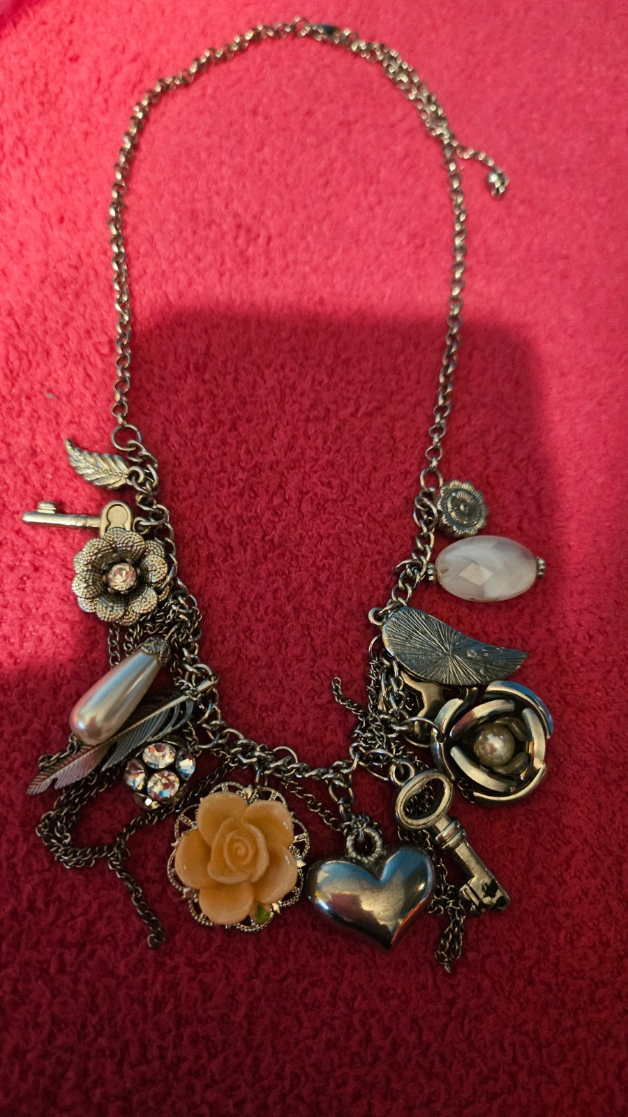 Cute 18 inch Necklace with various charms as shown