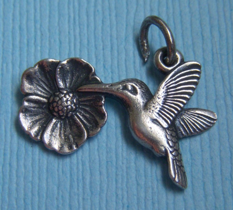 Retired James Avery hummingbird and flower sterling charm