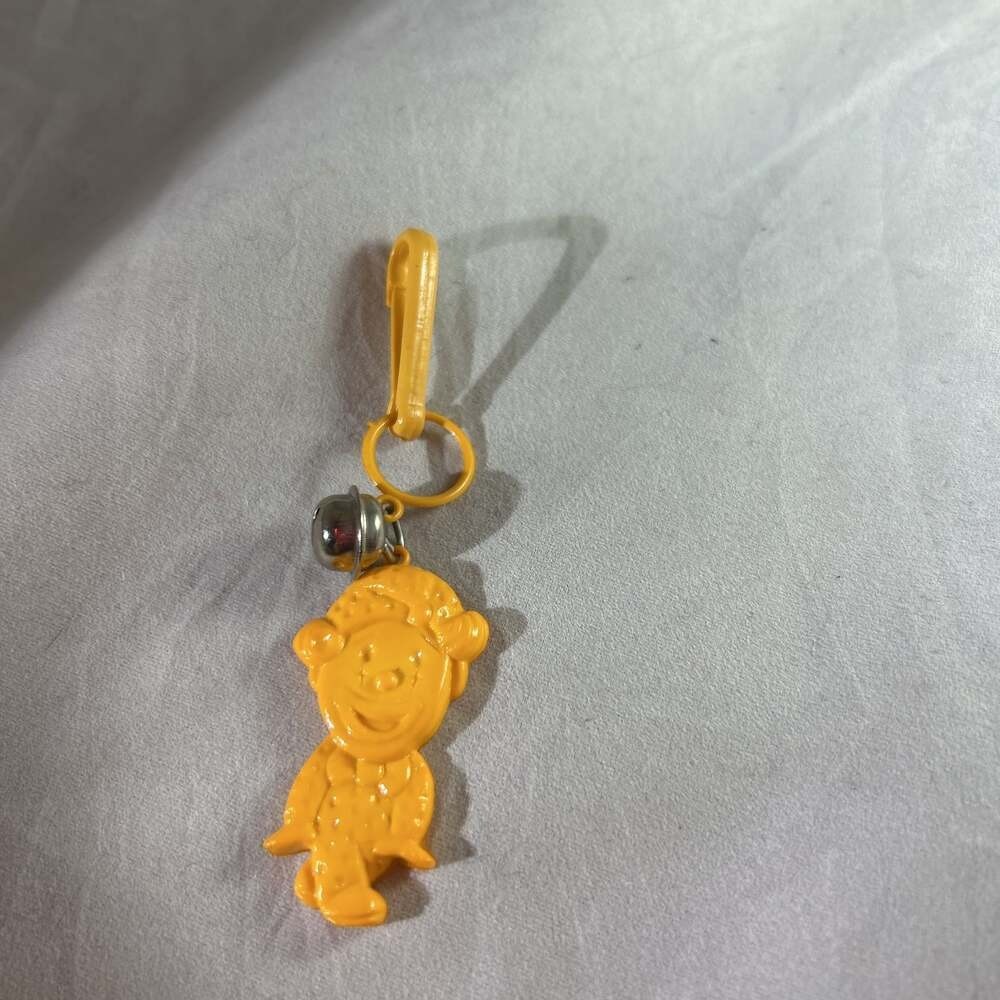 Vtg 80’s Plastic orange boy Clip On Charm with Bell For Charms Necklace
