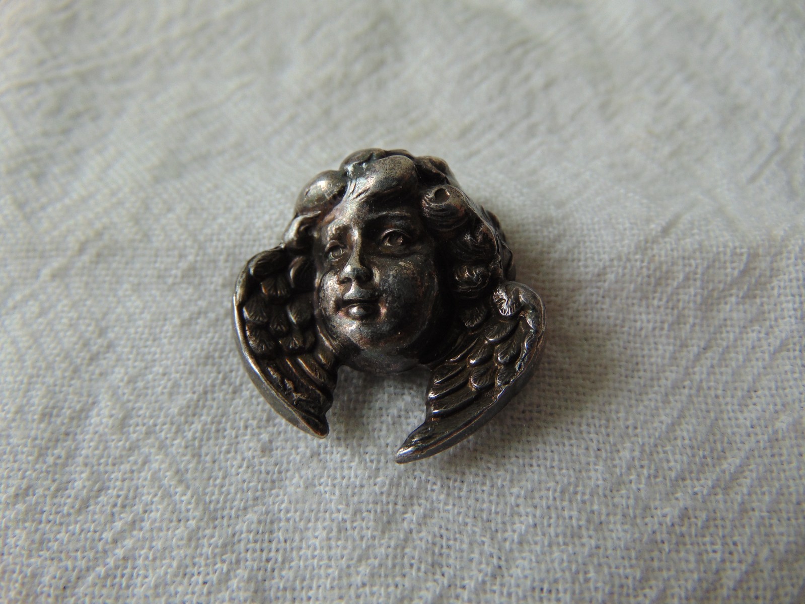vtg oxidized silver Angel Face brooch