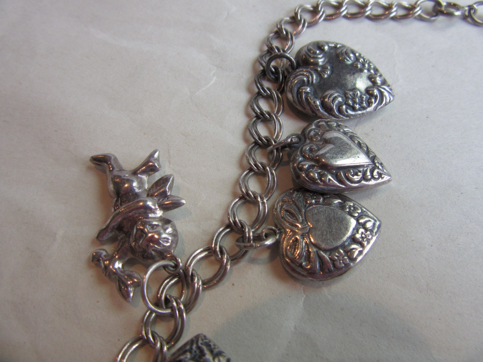Vintage double link chain necklace with 22 heart, love themed charms 61.8 grams