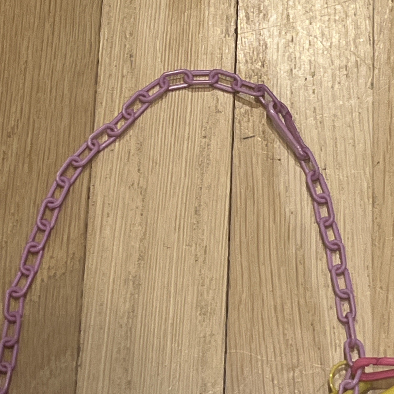 Vintage 1980s Plastic Clip-0n Bell Charm Necklace..20 charms