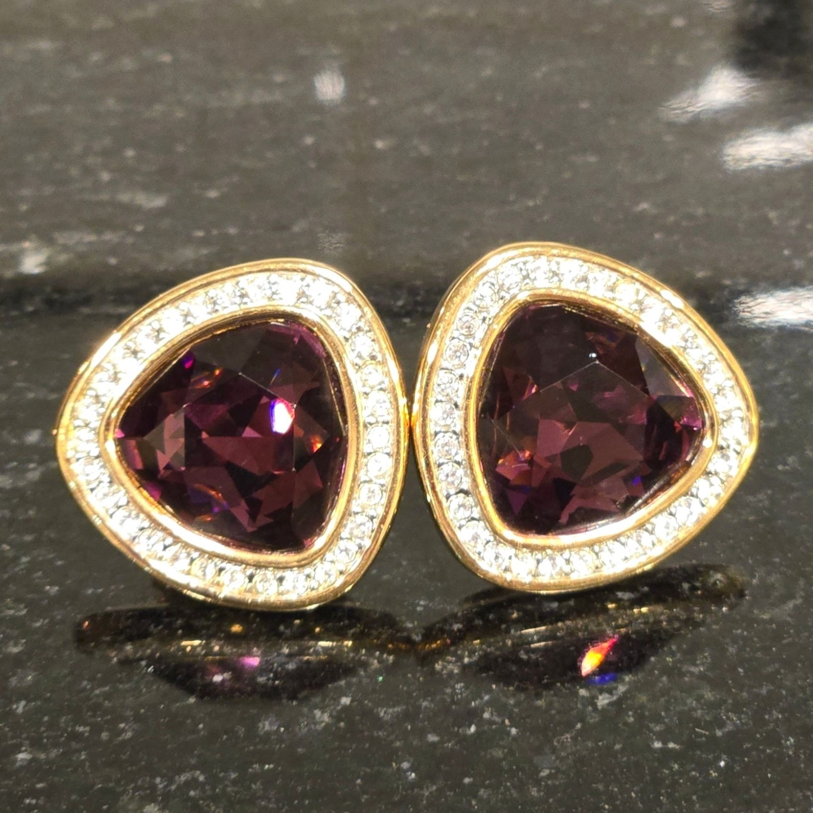 Vintage Swarovski Crystal earrings amethyst colored faceted stones clip on rare