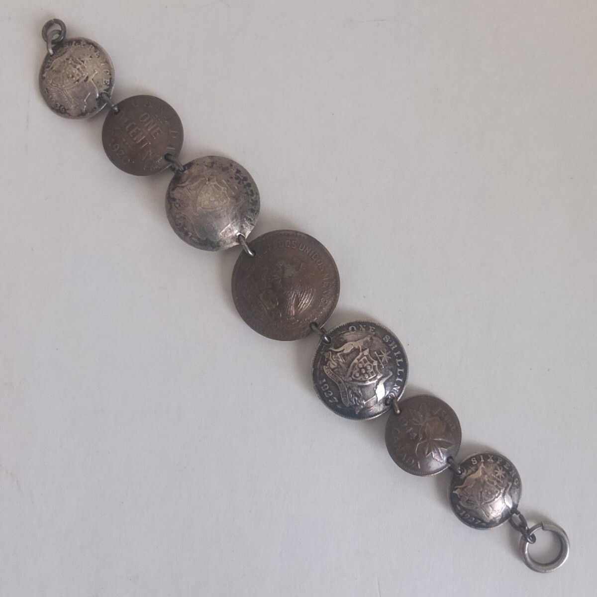 vintage folk art bracelet—coins from 1911 to 1945—four are Australia .925 silver