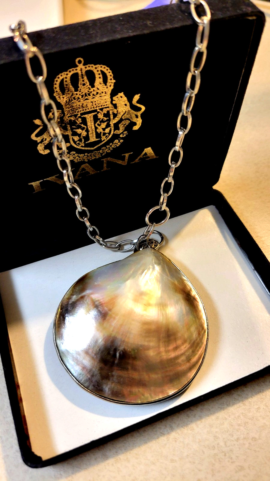 South sea mother of pearl pendant on 16″ silvertone chain with extender by Ivana