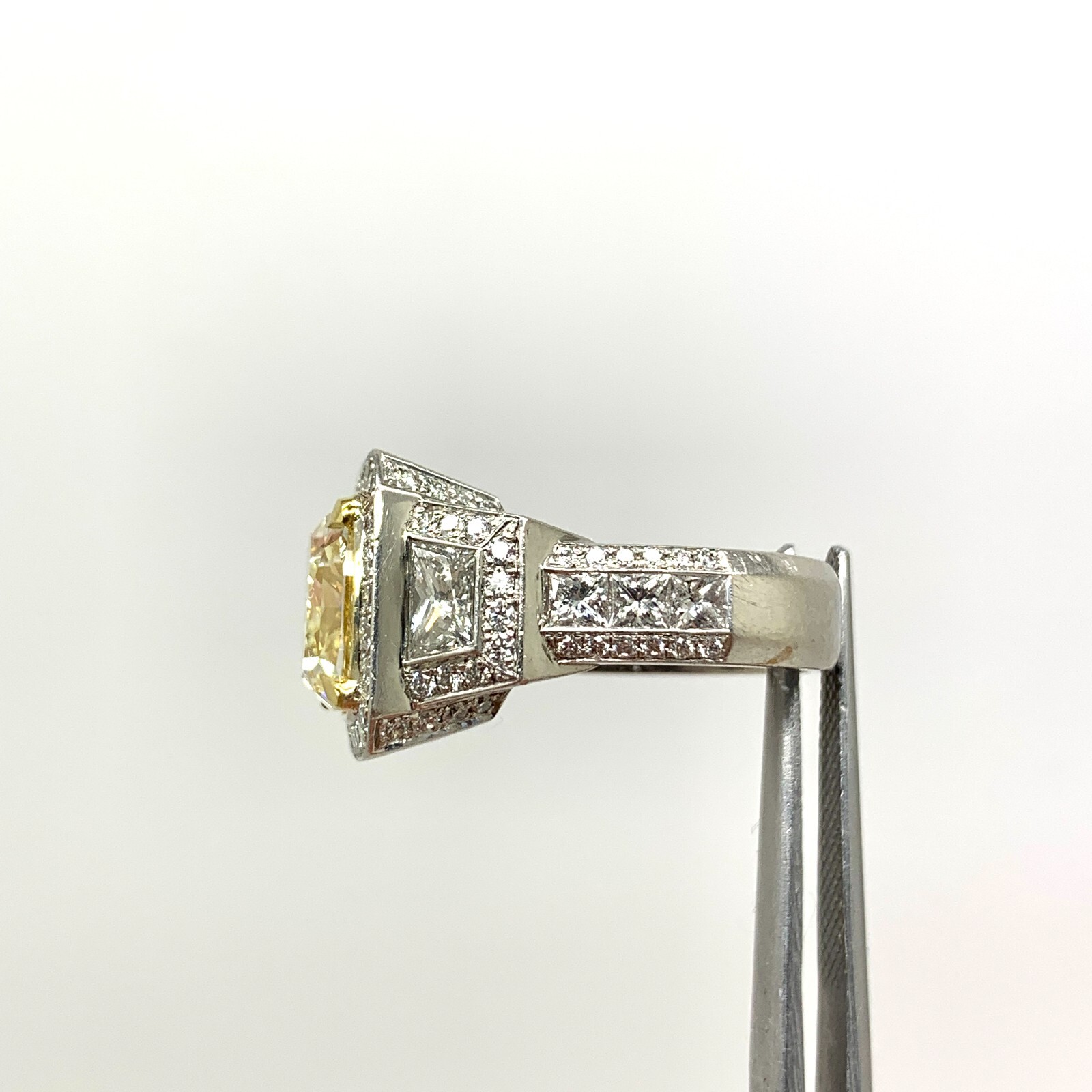 5.03 ct Fancy Light Yellow Diamond & 2.41 White Diamonds Platinum Ring